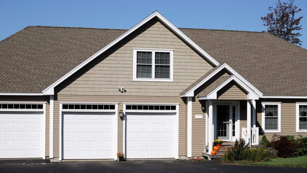 A home with one-car fiberglass garage doors
