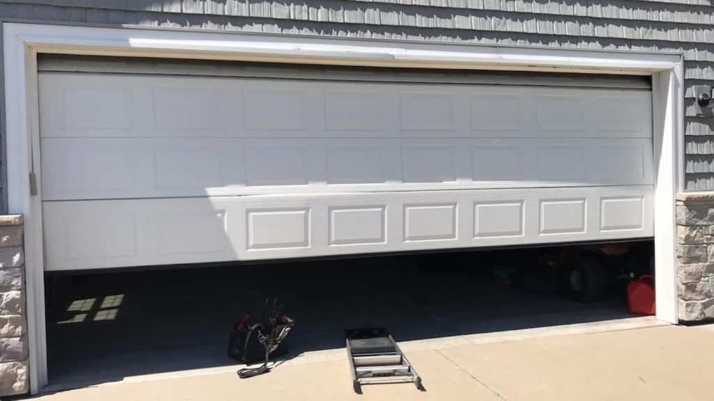 A door being checked for garage door alignment
