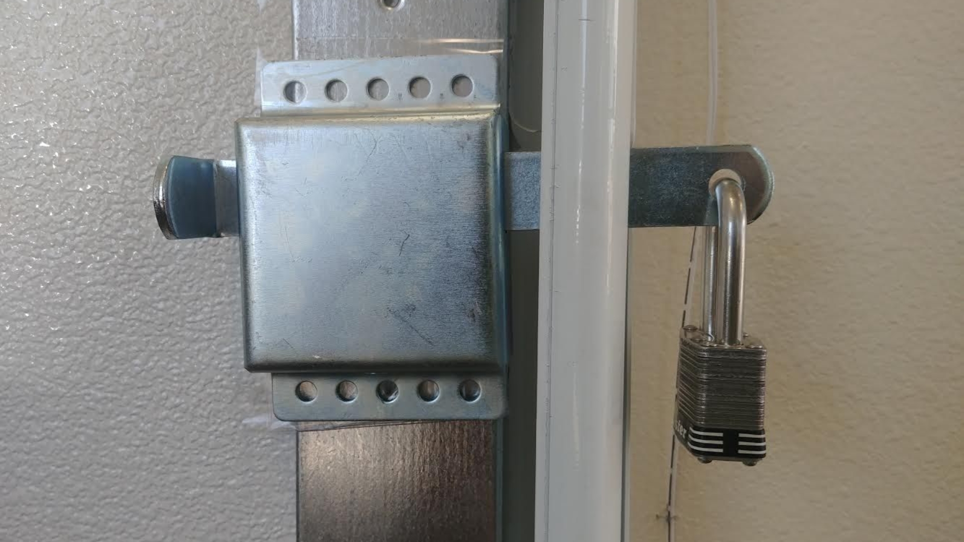 Garage door locks installed in a garage door