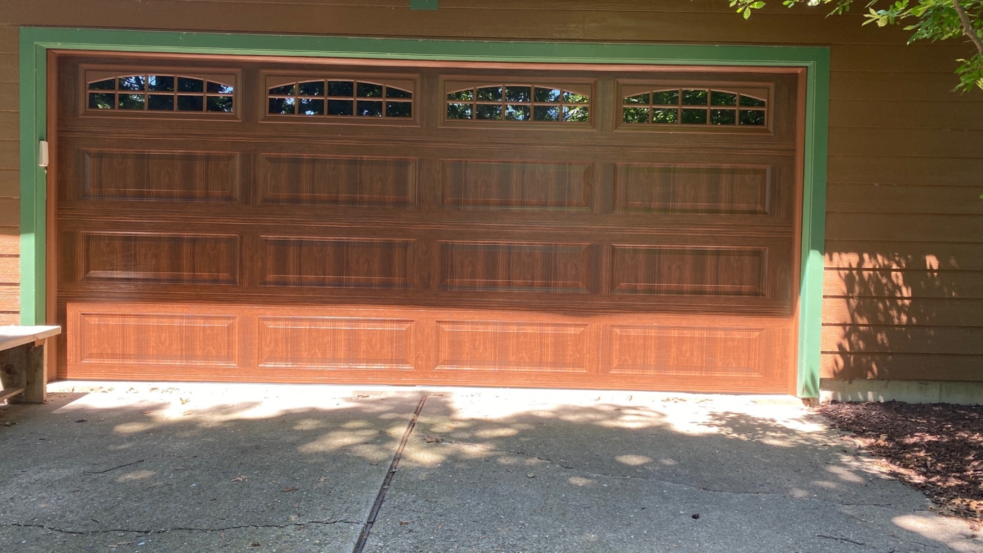 A steel garage door with custom panels