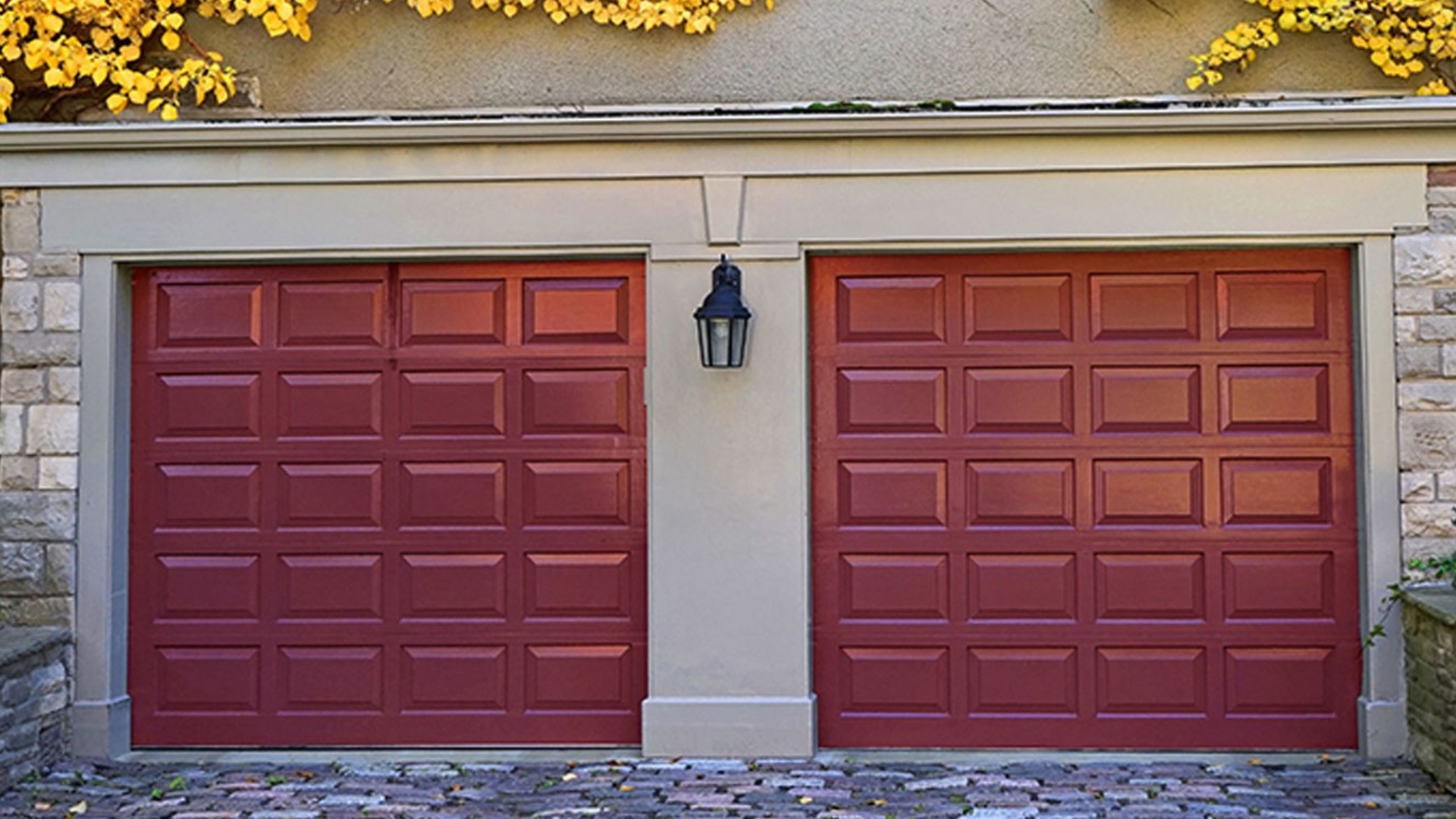 A red-painted residential garage door