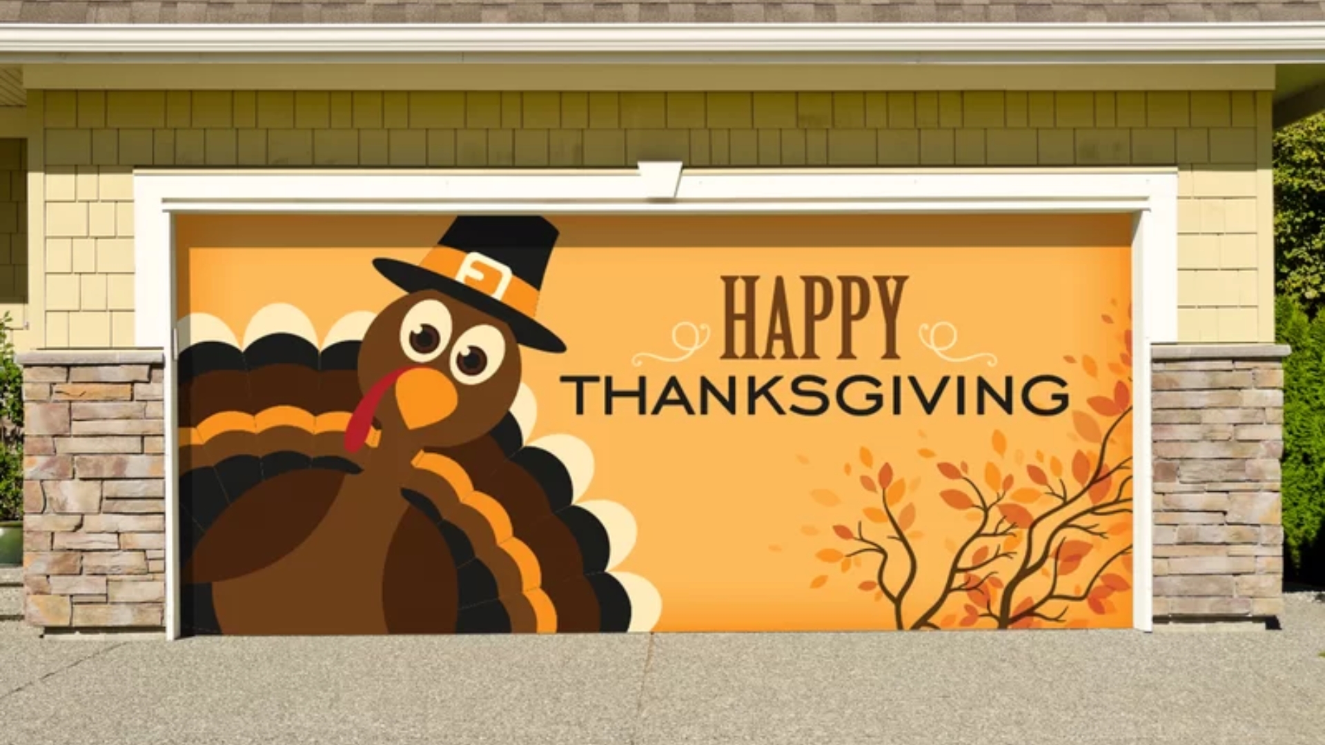 Seasonal garage door decorated for Thanksgiving with fall tones.