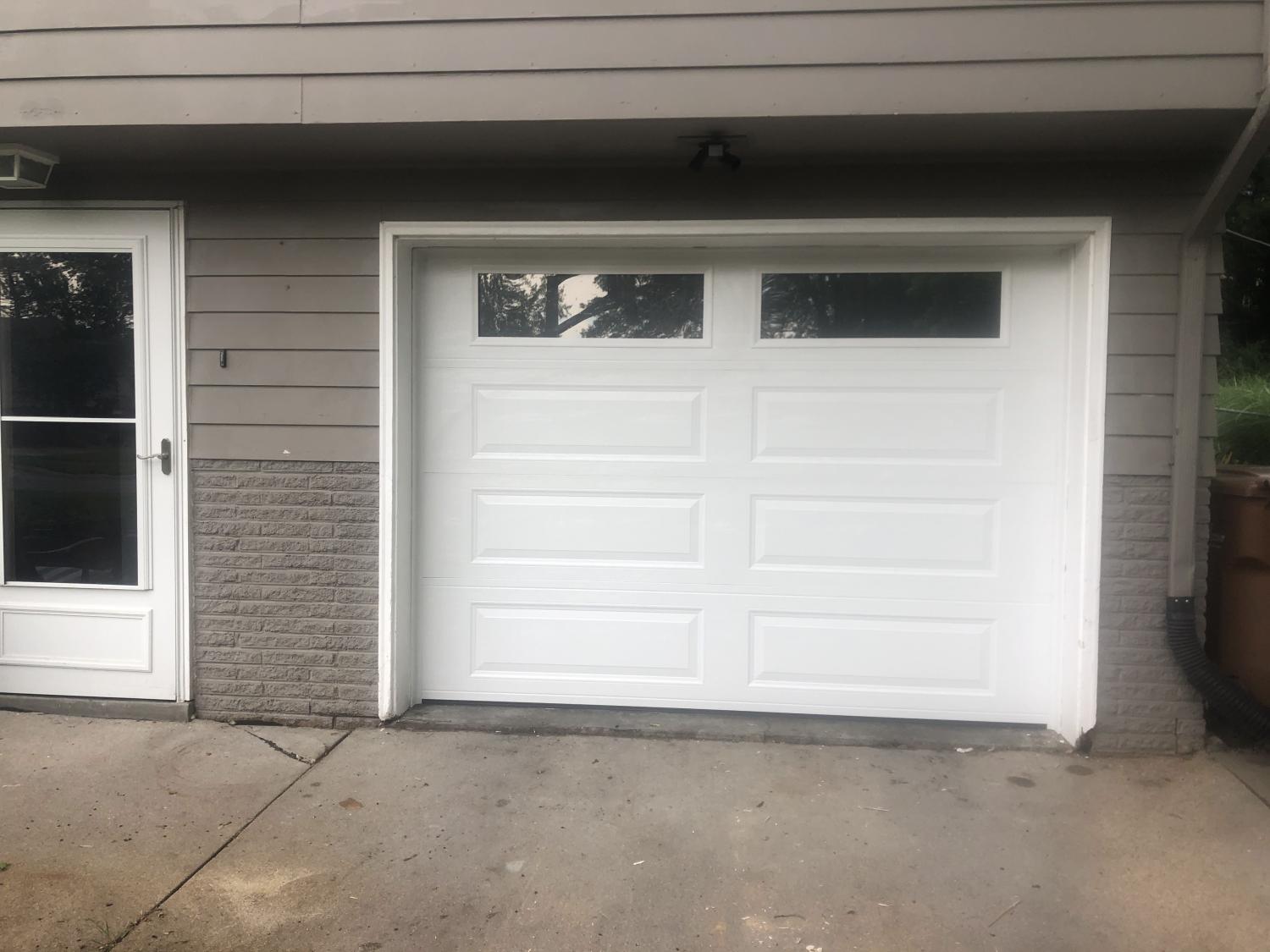 new garage door replacement cost to replace garage door garage door installation garage door installation near me New Garage Door Installation New Garage Door Installation Madison St, Bennet