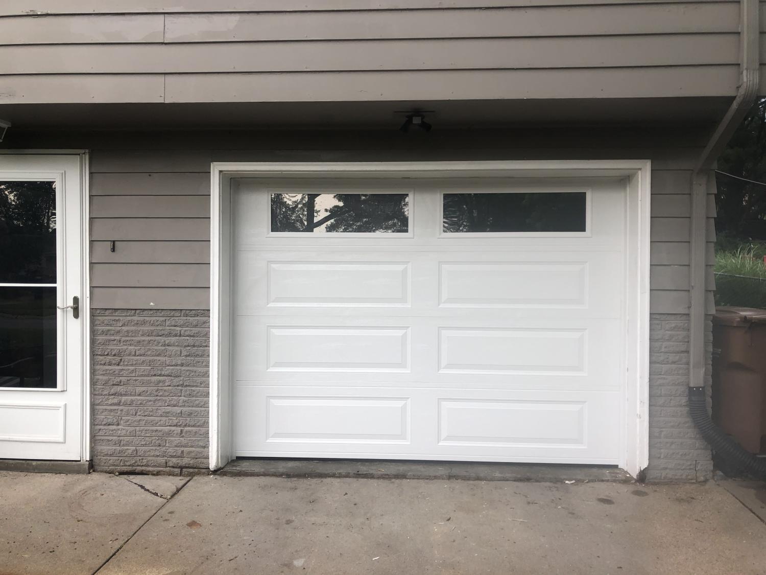 New Garage Door Installation new garage door replacement cost to replace garage door garage door installation garage door installation near me New Garage Door Installation Madison St, Bennet