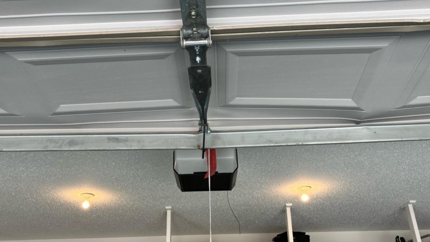 broken torsion spring garage door opener bracket garage door opener repair garage door repair garage door repair near me Garage Door Repair 13th St, Beatrice NE