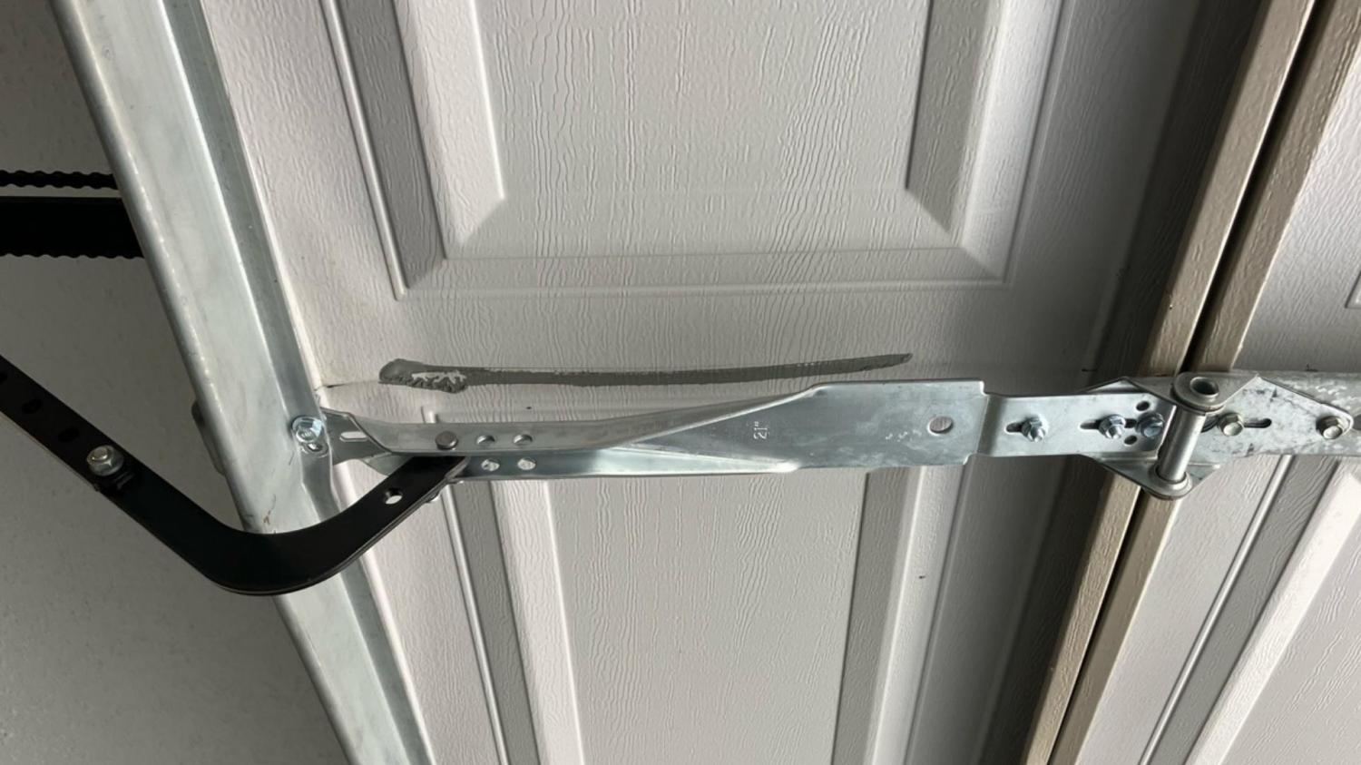 garage door opener bracket garage door opener repair garage door repair garage door repair near me broken torsion spring Garage Door Repair 13th St, Beatrice NE